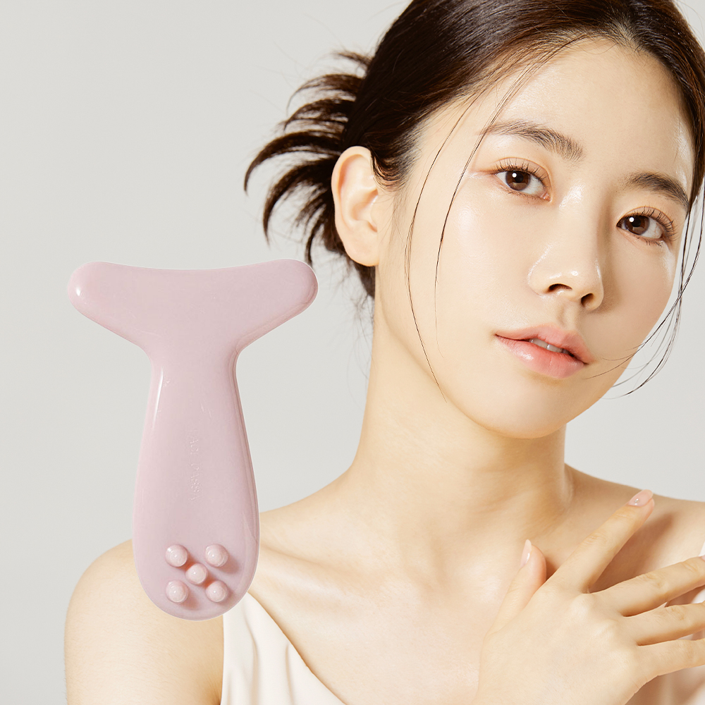 얼굴 괄사 마사지기